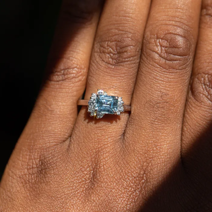 Rings Anueva Jewelry 180ct Emerald Cut Denim Blue Sapphire and Asymmetrical Diamond Cluster Ring in Platinum